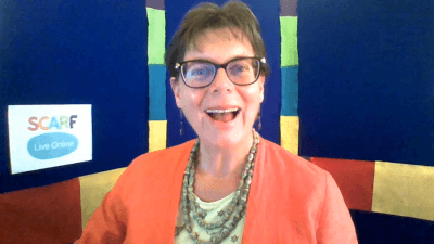 Educator smiling as she delivers SCARF Live Online workshop